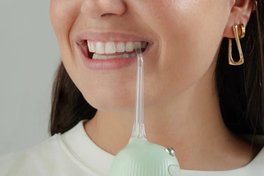 Dental Floss Types: Which Is Right For Your Teeth? 4 Water flosser flare 5 lr 73e15d7a 6d11 4bee 91dc b02c9b413585
