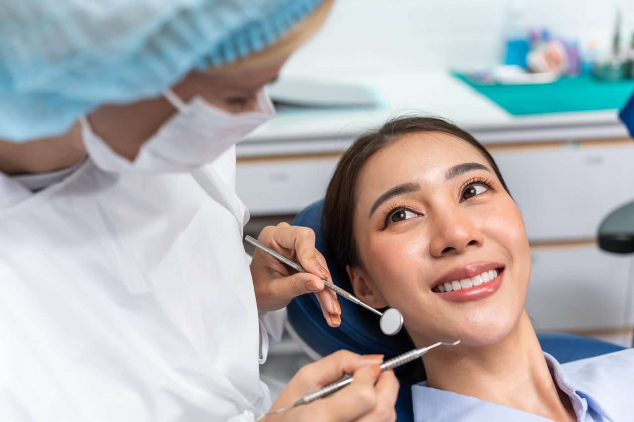 woman at the dentist for teeth checkup