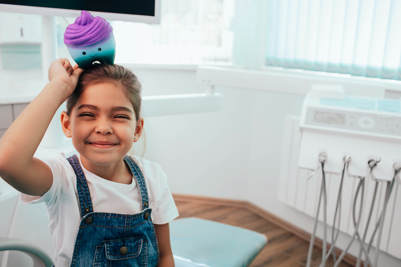 Little kid having fun at the dentist